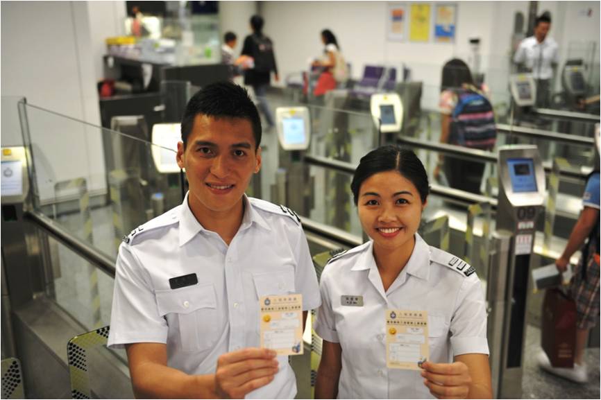 Immigration Control Officers say, "Please cast your highly valued vote!"