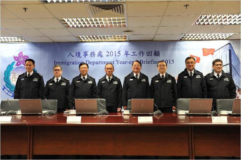 The Director of Immigration, Mr Chan Kwok-ki (fourth right), chairs the press conference at the Immigration Department's year-end review of 2015 today (February 1).