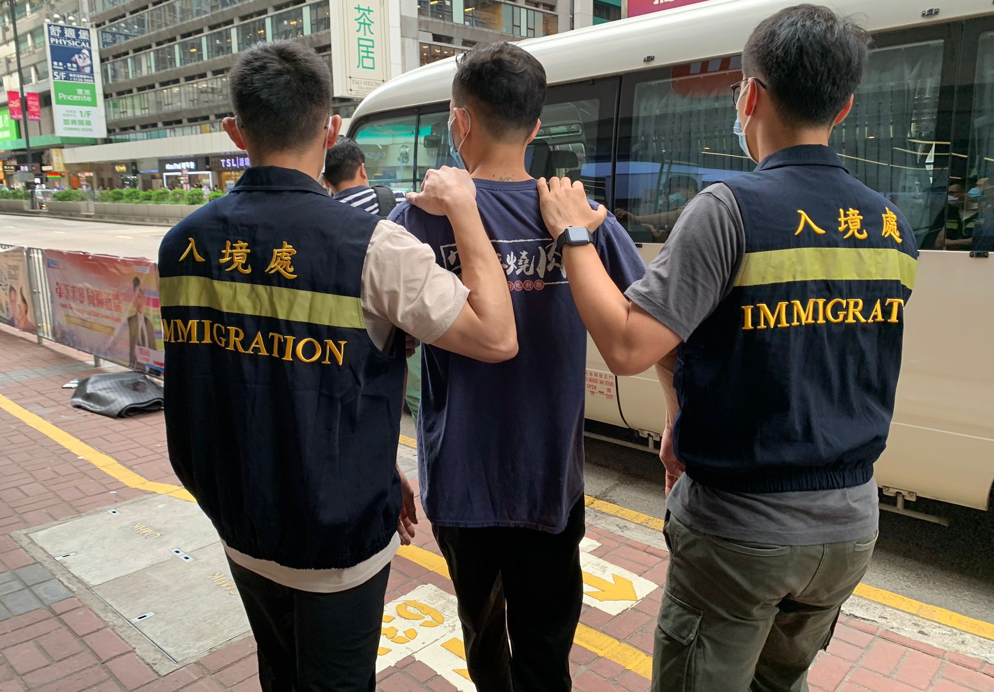 Photo shows suspected illegal workers arrested during the operations.