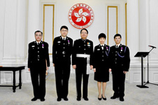 The awardees with the Director of Immigration Mr Chan Kwok-ki, Eric I.D.S.M. at the 2012 Honours and Awards Ceremony.