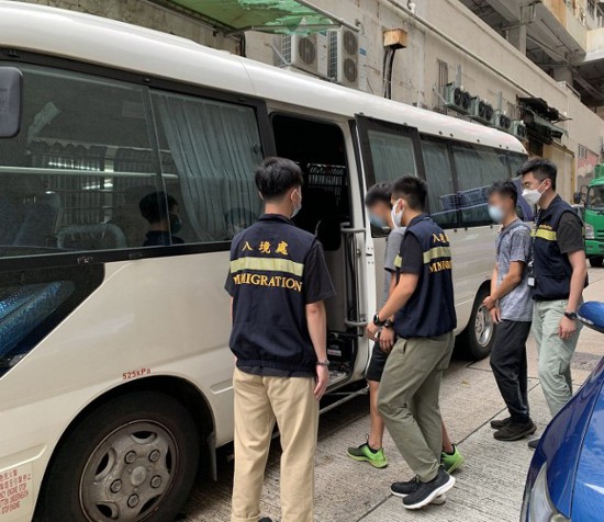 Photo shows suspected illegal workers arrested during the operations.