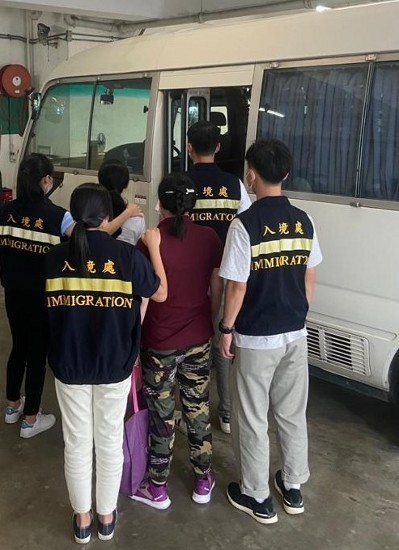 Photo shows suspected illegal workers arrested during the operations.