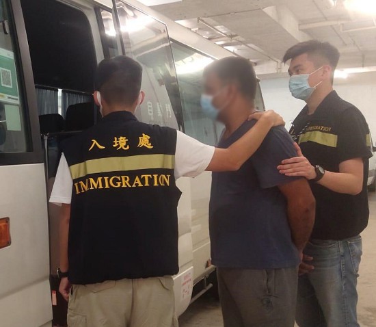 Photo shows a suspected illegal worker arrested during the operations.