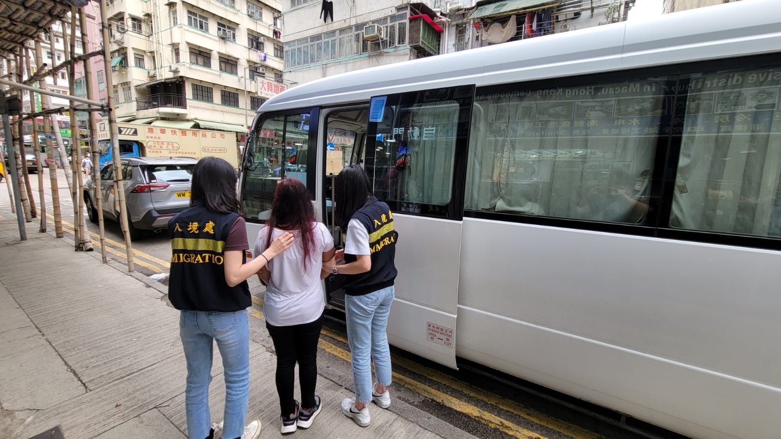 Photo shows suspected illegal workers arrested during the operations.