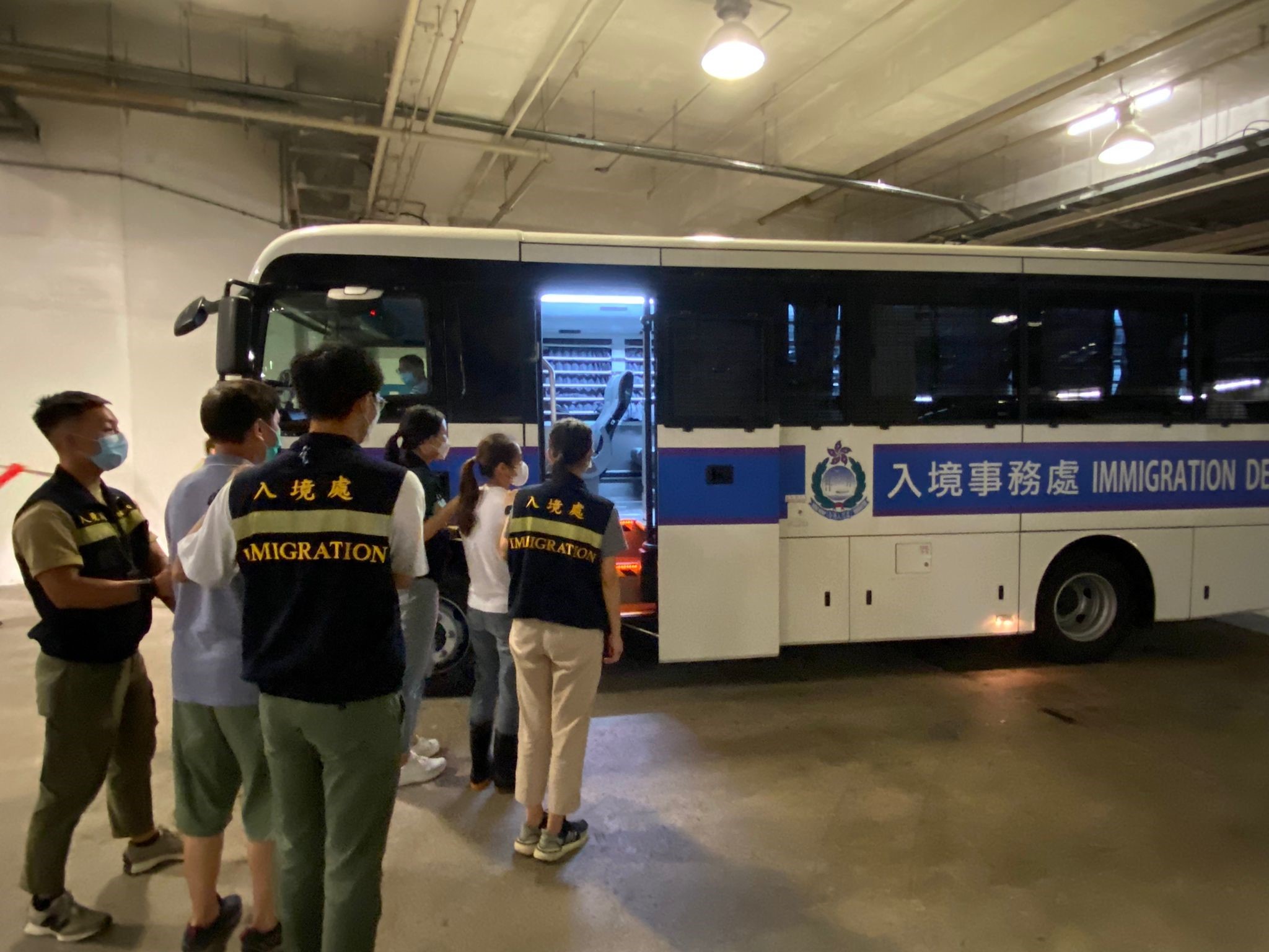 Photo shows suspected illegal workers arrested during the operations.