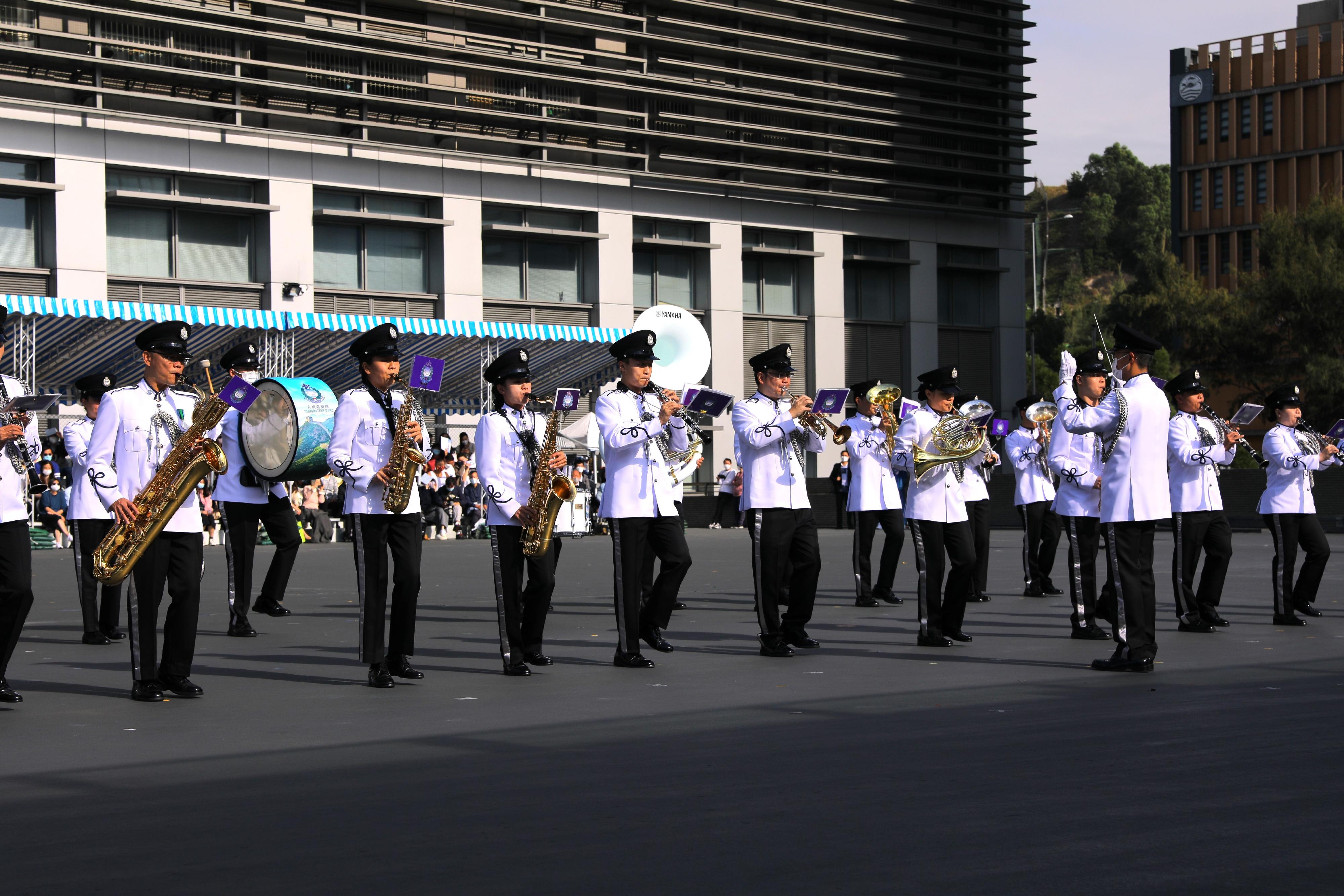 The Immigration Band performs at the Immigration Department Passing-out Parade today (December 2).