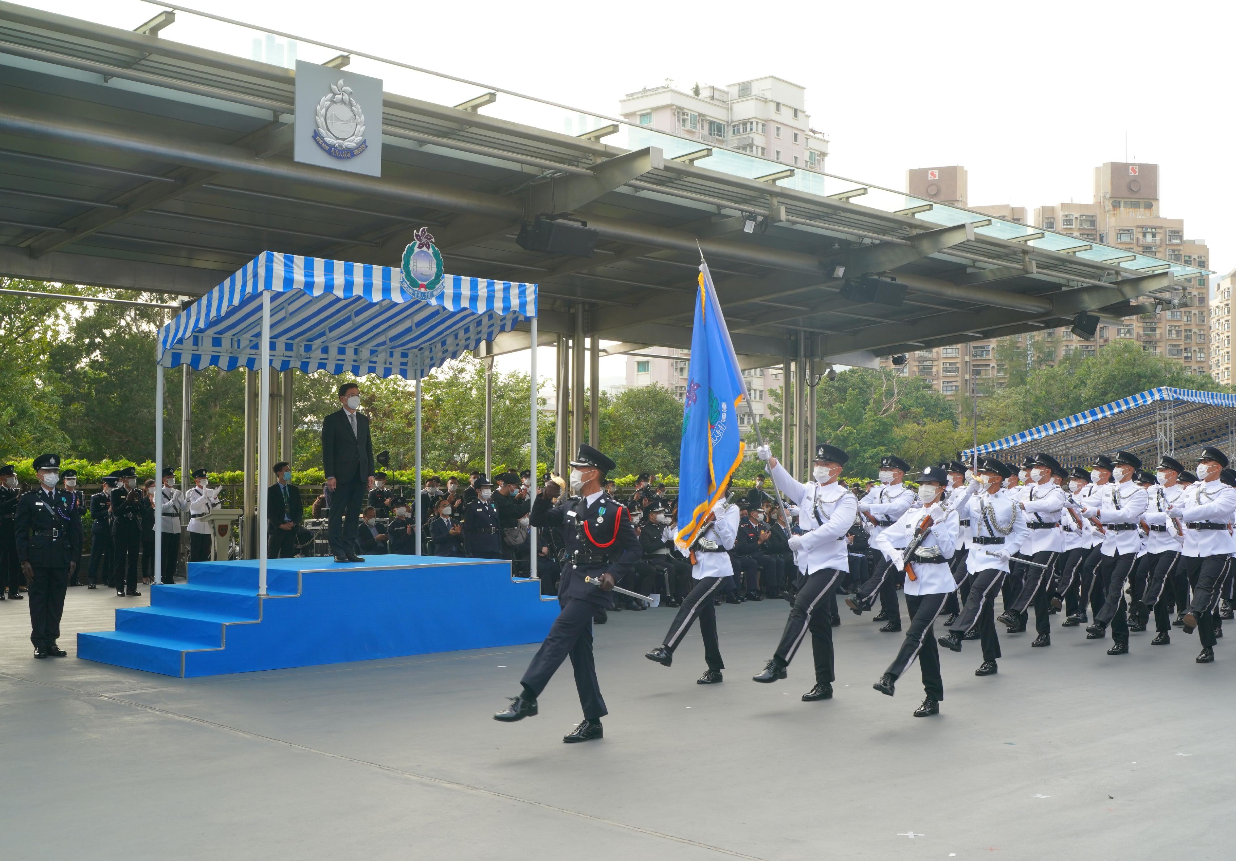 Photo shows passing-out officers forming a grand phalanx and goose-stepping past the dais in the Chinese-style footdrill performance.