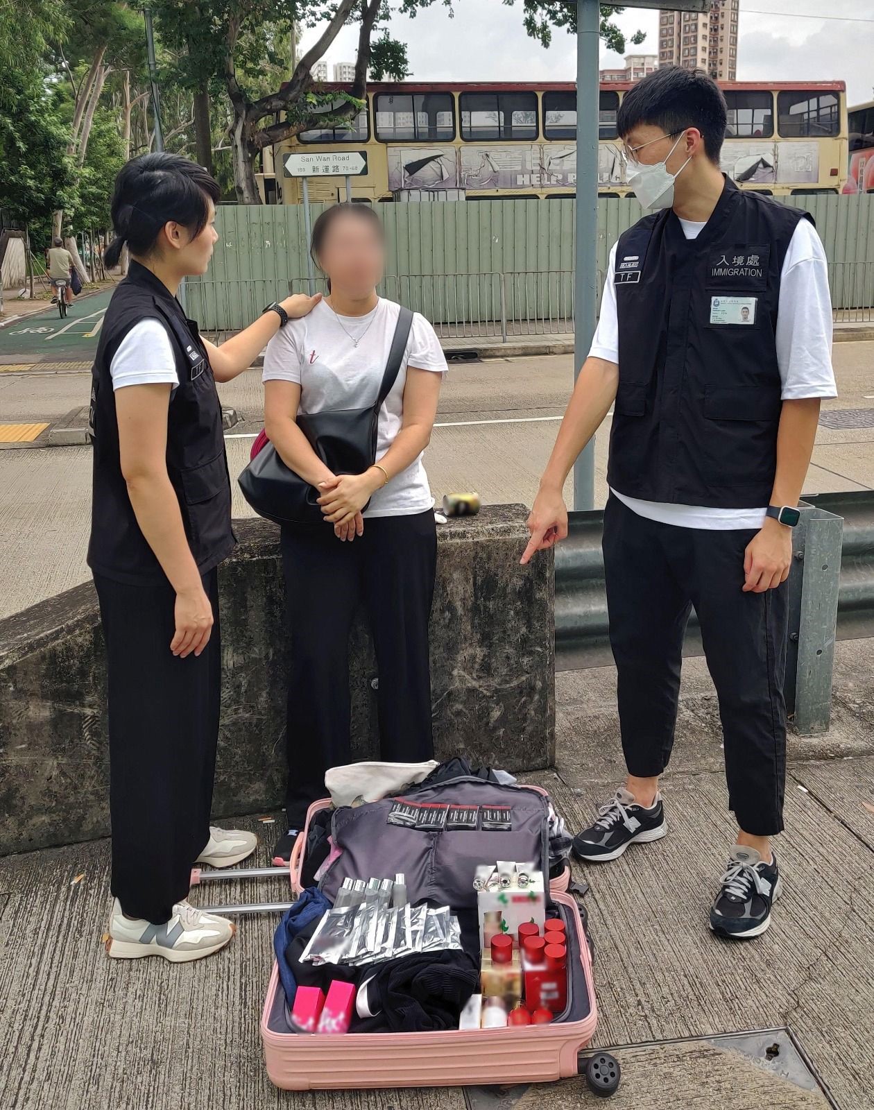 Photo shows a Mainland visitor involved in suspected parallel trading activities and her goods.