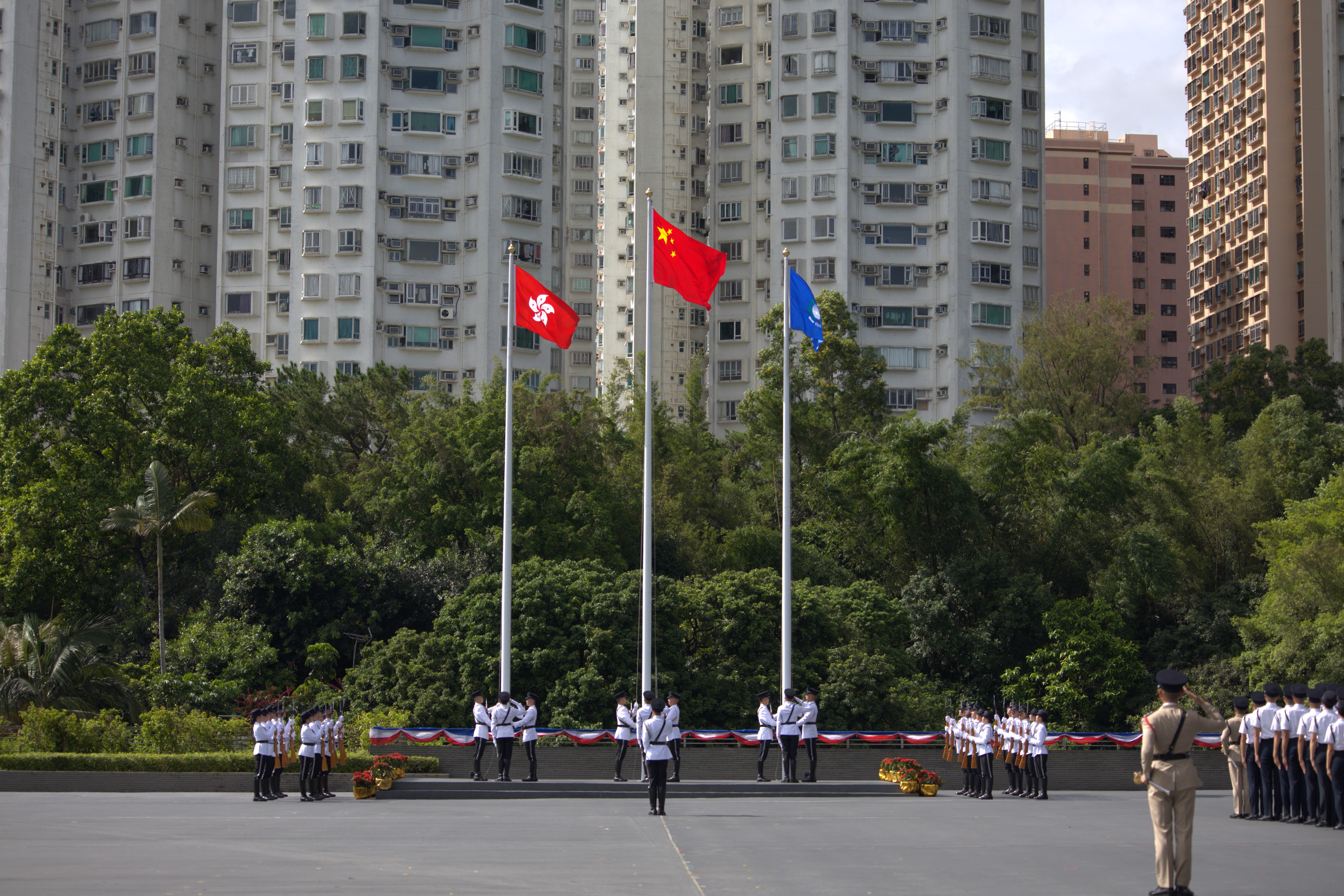 The Flag Party conducts a flag-raising ceremony at the Immigration Department Passing-out Parade today (September 13).