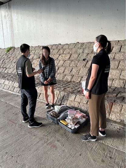 Photo shows a Mainland visitor involved in suspected parallel trading activities and her goods.