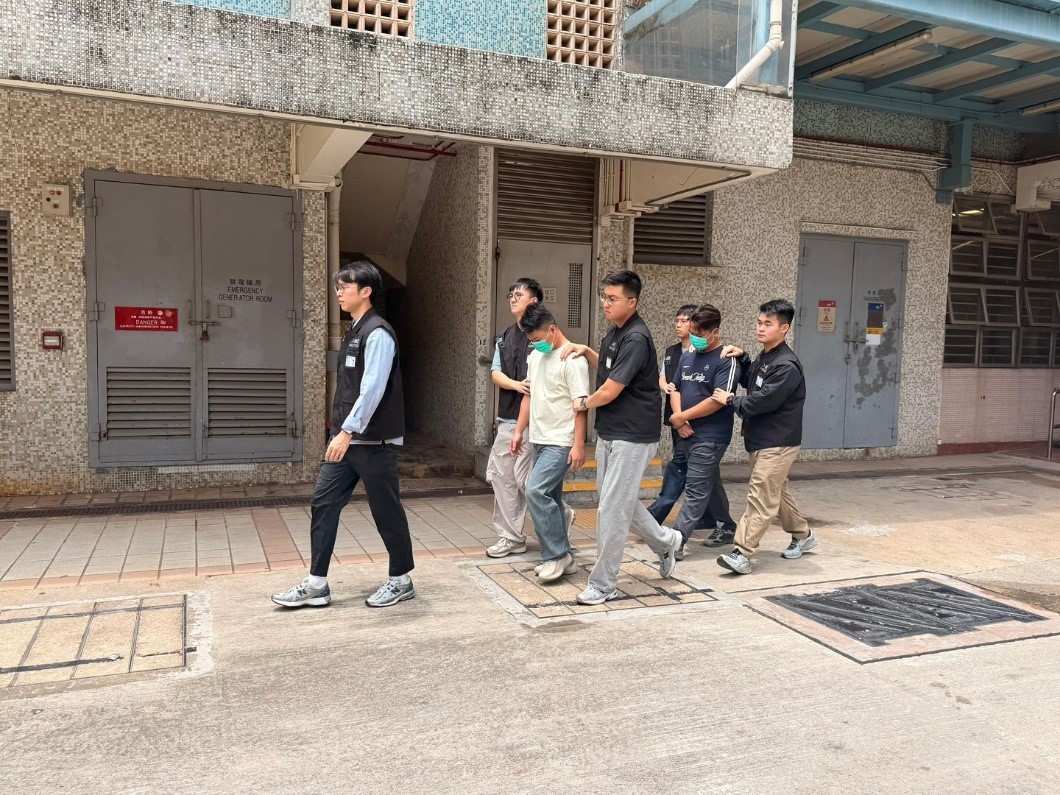 Photo shows suspected illegal workers arrested during an operation