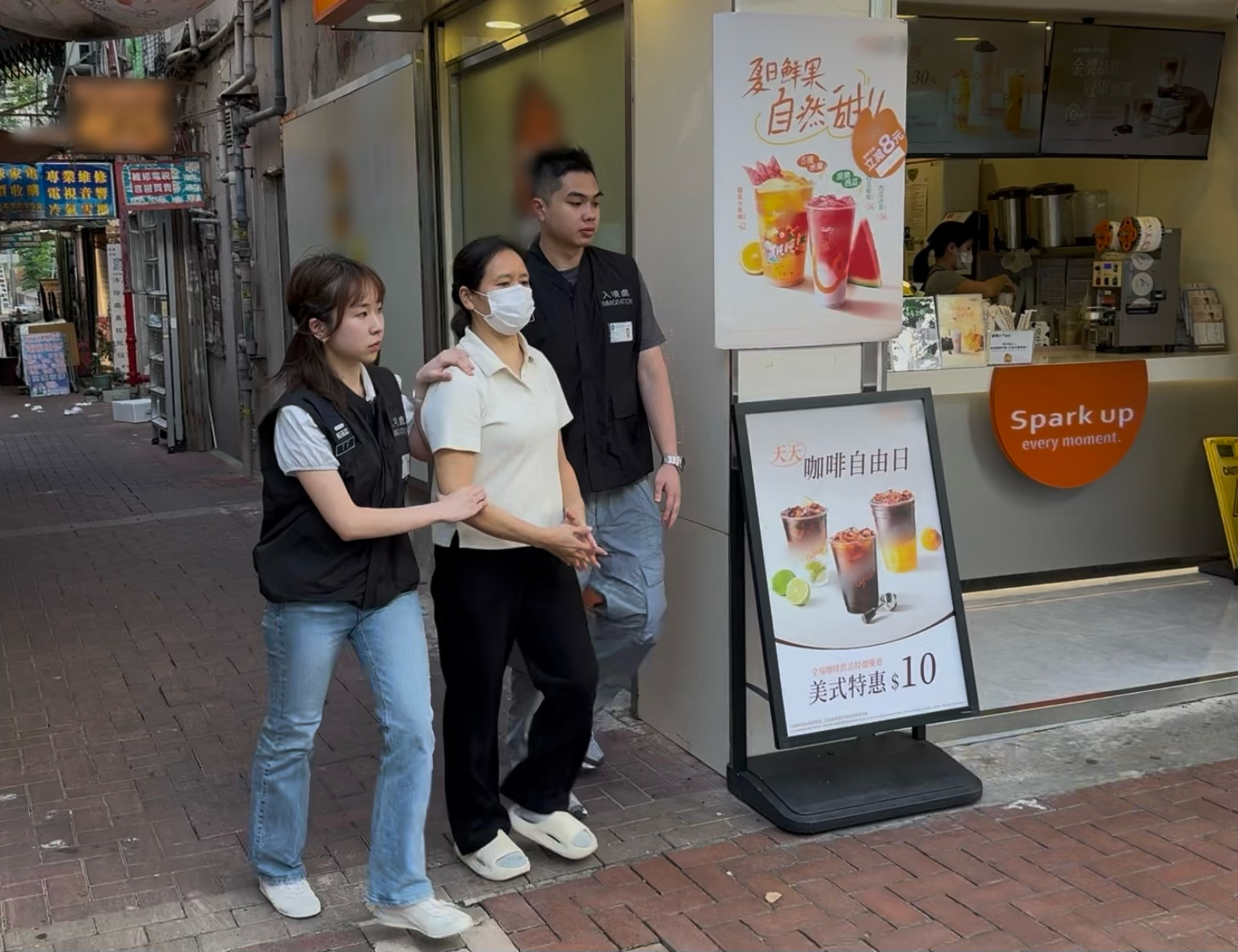 Photo shows a suspected illegal worker arrested during an operation