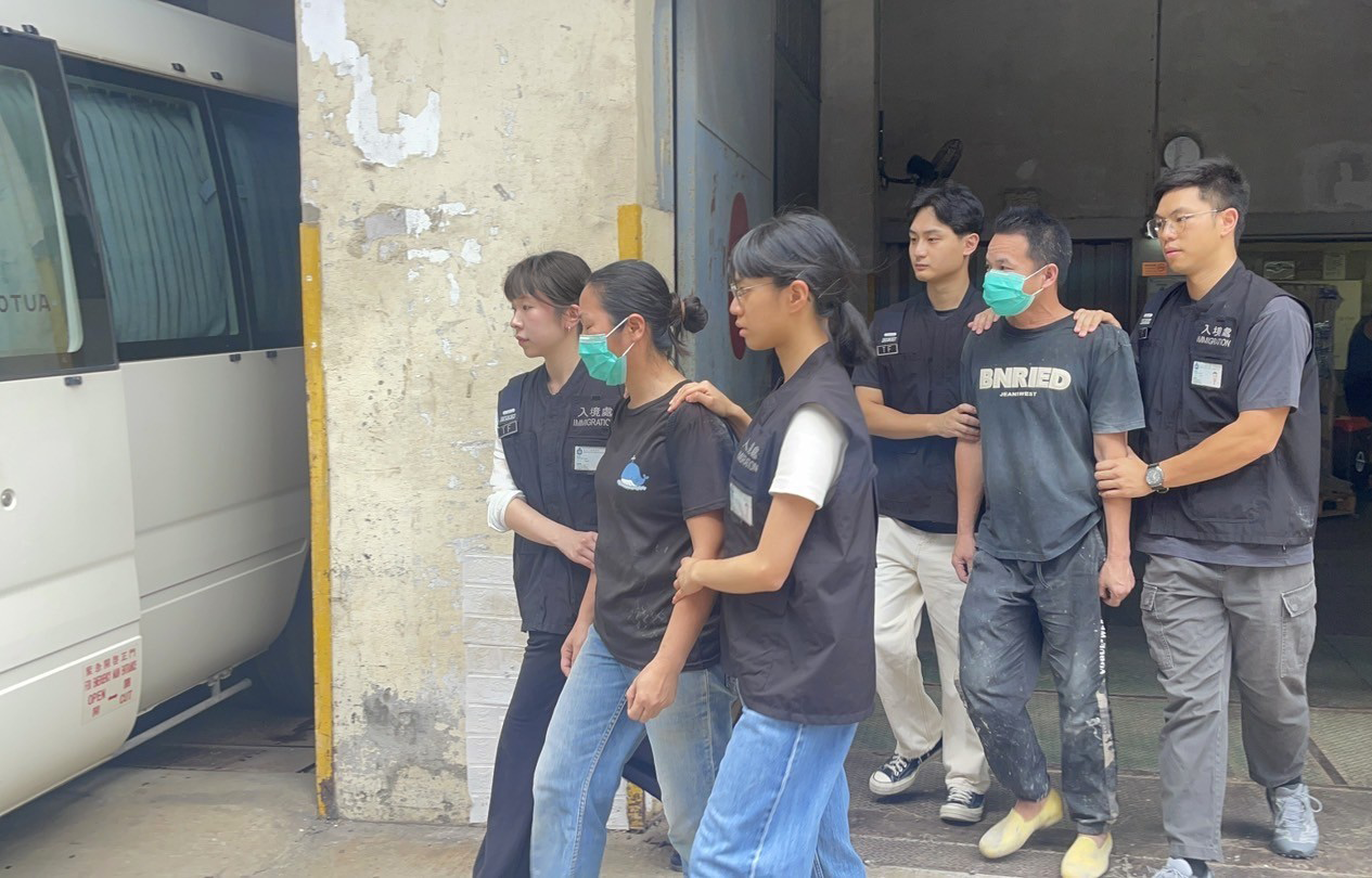 Photo shows suspected illegal workers arrested during an operation