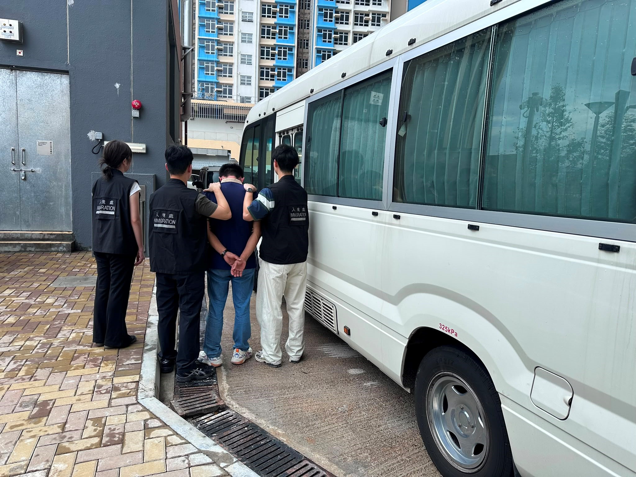 Photo shows a suspected illegal worker arrested during the operation