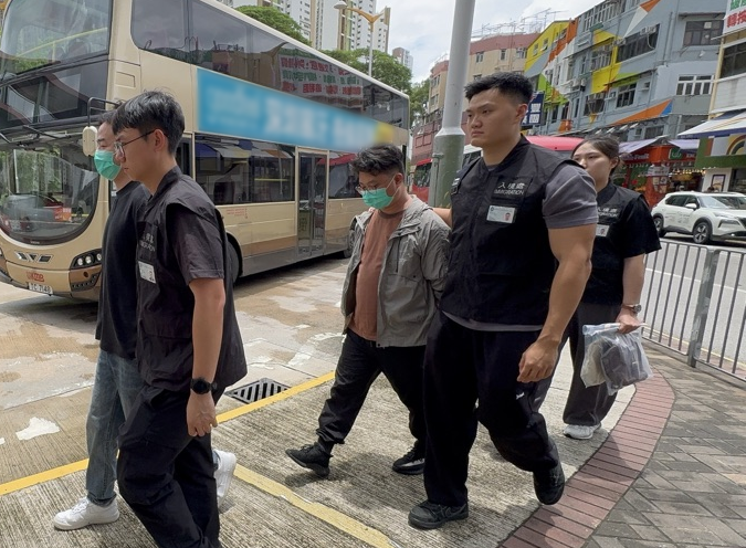 Photo shows suspected illegal workers arrested during an operation