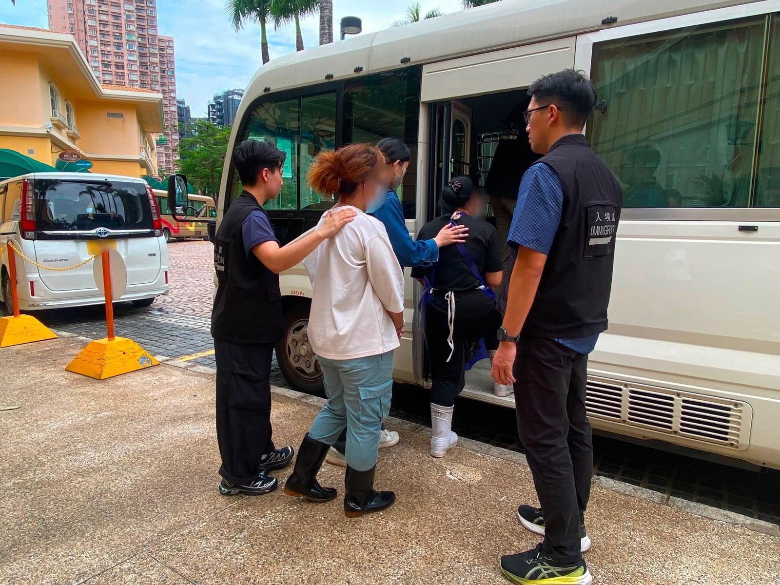 Photo shows suspected illegal workers arrested during an operation