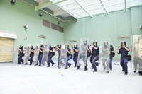 Immigration service staff responsible for the operation of the CIC receiving tactical training.