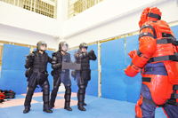 Immigration service staff responsible for the operation of the CIC receiving tactical training.