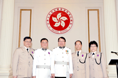 Six awardees with the Director of Immigration Mr K K Chan I.D.S.M. at the 2011 Honours and Awards Ceremony.