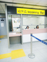 Barrier-free service counters and tactile guide paths provide convenience to persons with disabilities.